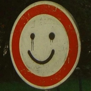 SMILING (?)